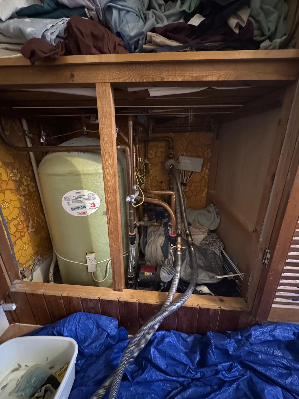 Boiler area and power flushing equipment during central heating cleaning